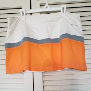 Nike orange skirt/shorts for tennis or golf